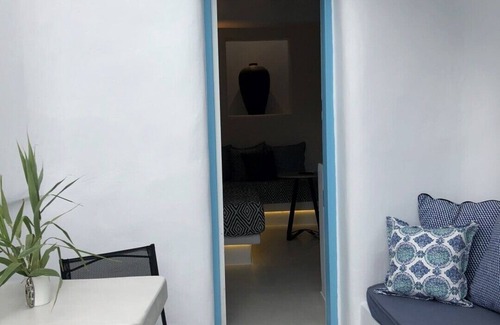 Platis Gialos Apartment | Mykonian Mews H1 Luxury Cave Suite with outdoor jacuzzi, lounge and cuisinette