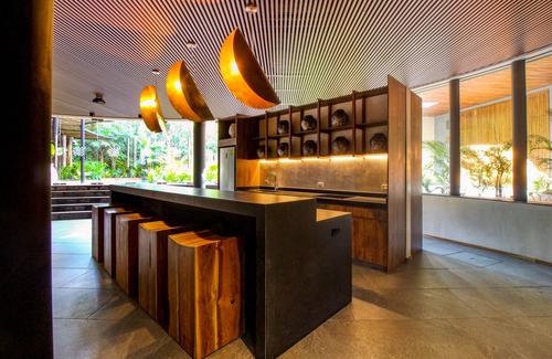Zama Apartment | Nature-inspired studio with balcony, kitchenette, & pools - near beach
