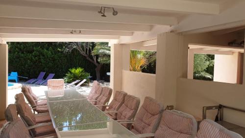 Les Tres Cales Villa | Near the beach, 8 bedrooms, sleeps 22, Jacuzzi, Full AC, BBQ, 2 kitchens, 2 dishwashers, fast internet, ping pong, cars not necessary