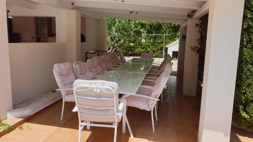 Les Tres Cales Villa | Near the beach, 8 bedrooms, sleeps 22, Jacuzzi, Full AC, BBQ, 2 kitchens, 2 dishwashers, fast internet, ping pong, cars not necessary