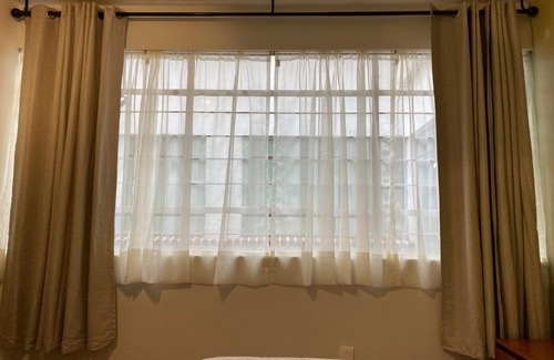 Benito Juarez House | Nebraska Suites WTC