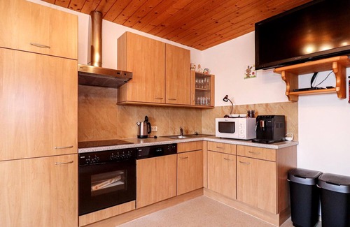Kliening Apartment | Nestled in a landscape of forests, alpine meadows and mountains, these two vacation apartments (AKA1