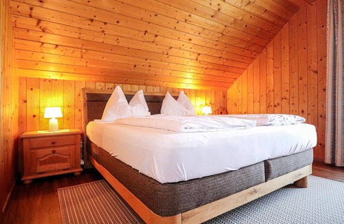 Kliening Apartment | Nestled in a landscape of forests, alpine meadows and mountains, these two vacation apartments (AKA1