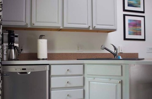 Douglas Condo | New 2 BR condo & private courtyard. CLEAN. Modern Kitchen. Walk/bike to town.