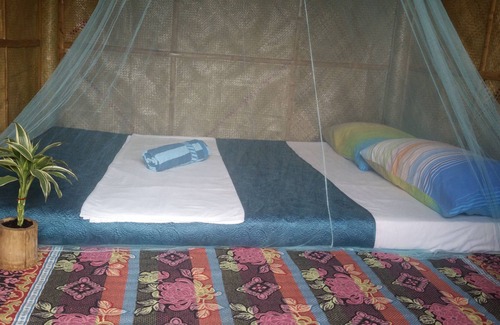 El Nido Bed & Breakfast | New Bamboo Chalets. Private rooms at hostel prices. Close to beach and town.