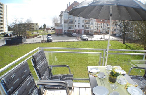 Grossenbrode Apartment | New building apartment "coastal magic 18" with sea view, sunny balcony, beach chair