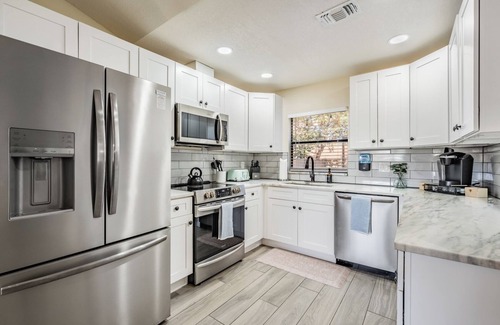 Clearwater House | NEW Coastal 3BR Oasis | Heated Pool & Spa, Fire Pit, Game Room