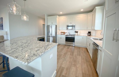 South End House | New Construction, Oceanfront Duplex. Top level 4BR/3.5BA with private elevator.