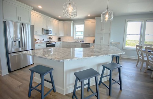 South End House | New Construction, Oceanfront Duplex. Top level 4BR/3.5BA with private elevator.