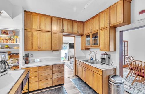 Garfield Heights House | NEW! Cozy Getaway with Hot Tub, Patio & Fenced Yard
