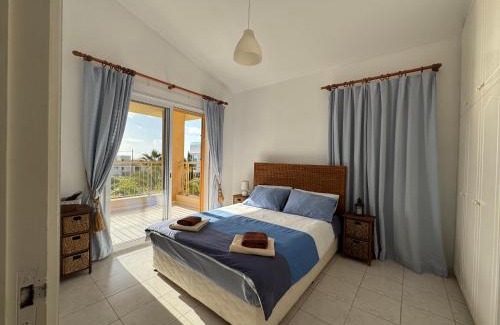 Paphos Villa | New cozy Villa near the beaches in the Magnificent Gardens of Regina with swimming pools!