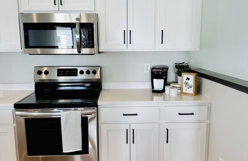 Fargo House | NEW family- friendly 3 bedrm home in West Fargo with space to gather and relax.