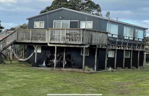 Whangaruru House | New: House & Cabin steps from the beach, with space and privacy for two families