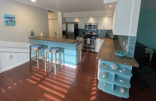 Windward House | NEW Listing - Beautiful, spacious, coastal patio home near beaches & golf.