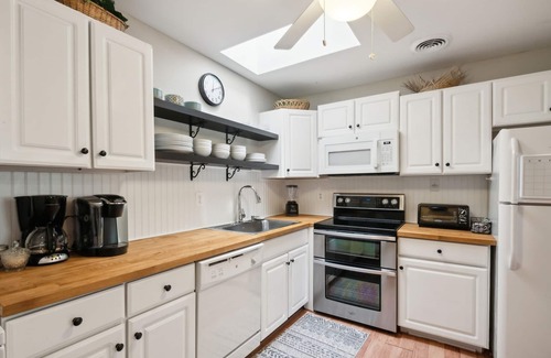 Village Green Condo | NEW LISTING! Cozy 2BR Condo - Beachside Bliss with Yard Space