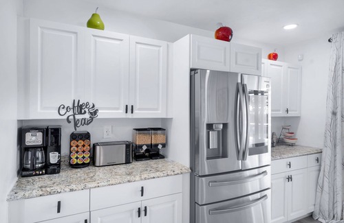 Miramar Villa | New Modern Retreat with King Bed/Heated Pool/Grill/only 8 miles to Beach!