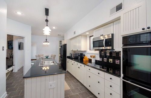 Slidell House | New Orleans Suburban Waterfront 5BR Home Sleeps 12 With Boat Dock