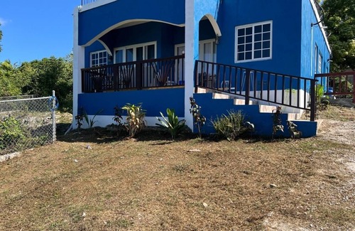 West End House | New! Private Cottage, Near Ricks Cafe, Ocean View with Rooftop Entertaining.