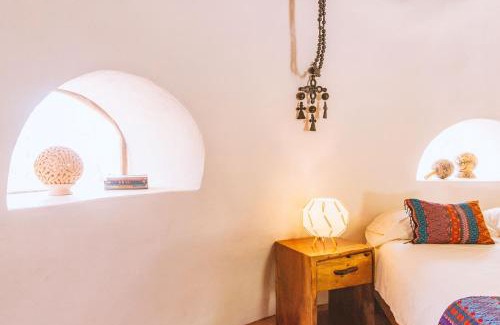 El Cacalote Cabin | New Ruins Off-The-Grid SuperAdobe Domes with Pool