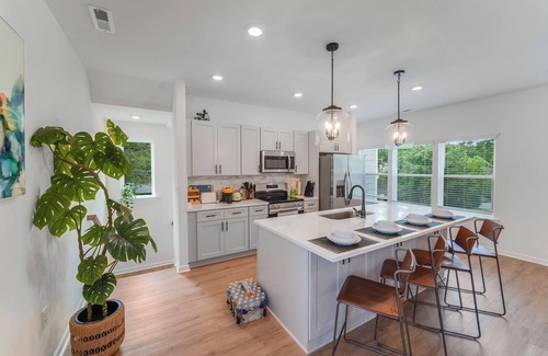 Cotswold House | New Stylish Townhome in Cotswold with Ensuite Baths, Chef's Kitchen & EV Charger