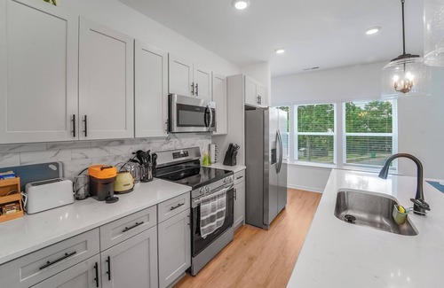 Cotswold House | New Stylish Townhome in Cotswold with Ensuite Baths, Chef's Kitchen & EV Charger
