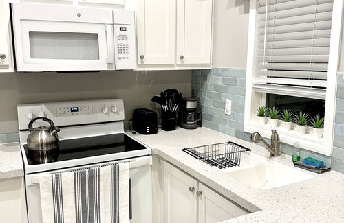 Largo Gardens House | New Tiny Home- Paddle Boards, Kayaks, Pool, Marina