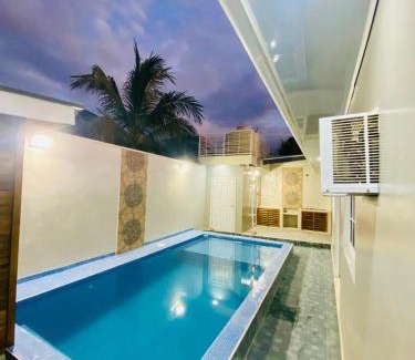 Tela House | NEW Vacation home with a swimming pool and barbecue area