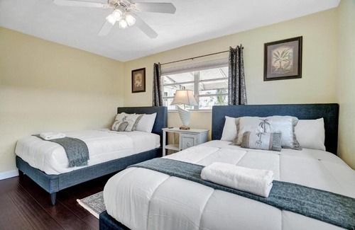 Garden Isles Villa | NEW Waterfront Oasis - Pool – Jacuzzi - 10 Min to Beach!