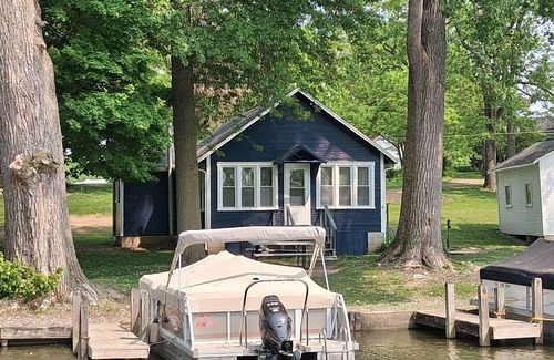 Lakeview Cottage | Newland's Resort: Cozy Channel Front Cottage #1 on Indian Lake with a boat dock