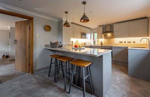 Sharrington Cottage | Newly renovated Brick & Flint cottage with stylish interiors, wood burning stove, beautiful garden,