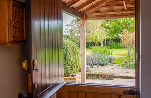 Sharrington Cottage | Newly renovated Brick & Flint cottage with stylish interiors, wood burning stove, beautiful garden,