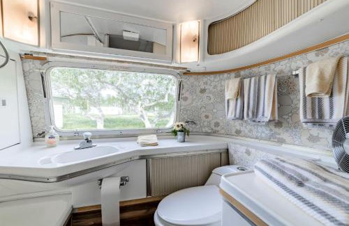 Spicewood House | Newly Renovated Camper with Fresh Decor and Tiny Deck in Texas
