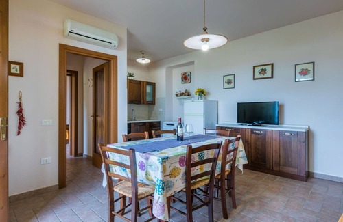 Castellina Marittima Apartment | Nice apartment for 7 guests with pool, WIFI, A/C, TV, patio, pets allowed and panoramic view