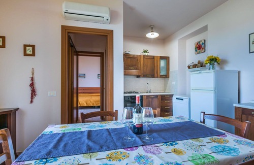 Castellina Marittima Apartment | Nice apartment for 7 guests with pool, WIFI, A/C, TV, patio, pets allowed and panoramic view