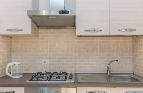 Capo Testa Apartment | Nice apartment for 4 people with A/C, TV, terrace, pets allowed and parking