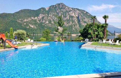 Bissone Apartment | Nice apartment for 4 people with A/C, pool, WIFI, TV, balcony and panoramic view
