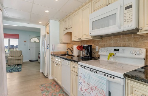 Avalon Condo | Nicely appointed two bedroom air conditioned Merrimac Condominium offering beachblock location