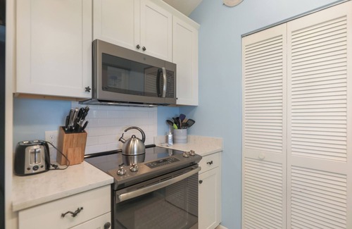 The Dunes House | Nicely updated Sanibel duplex home located in The Dunes with lake view.