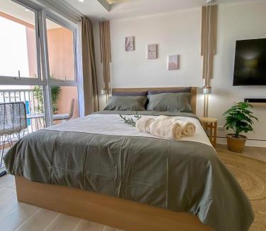 Pinagsama Apartment | nJoy! BOHO Luxury at Venice Grand Canal - perfect for business & couples