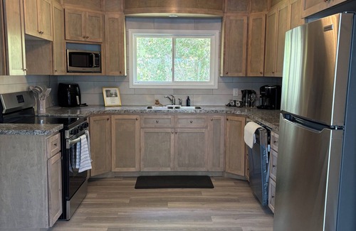 Clare Cottage | Noah’s private lakefront cottage, spacious for a peaceful and relaxing stay.