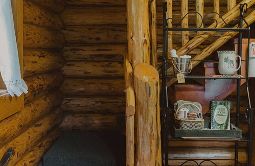 Seeley Lake Cabin | Nordic Cabin at Tamaracks Resort, a cozy log cabin with views of Seeley Lake.