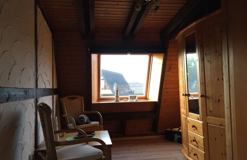 Nordseebad Burhave House | North Sea vacation home ROBBE in Burhave - directly at the DEICH! Pets welcome!
