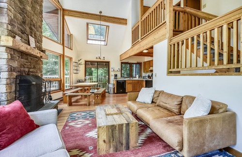 West Bridgewater Ski Chalet | Northeast Passage Chalet is a cozy and warm. Wonderful hot tub on the deck and a great big stone fireplace.