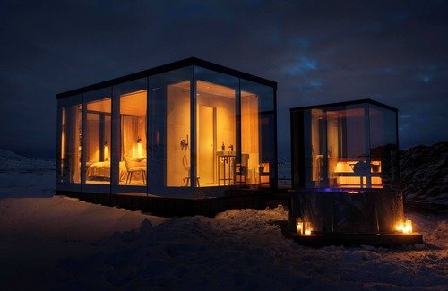 Rangarþing ytra Cabin | Northern lights galore! AURA Retreat Iceland - LOGN Cabin w hot tub & sauna.