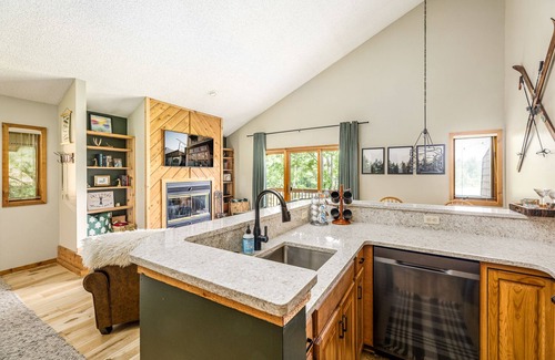 Mancelona Condo | Northern Michigan paradise! sleeps 7 KING bed. Private association outdoor pool