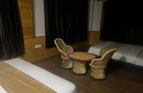 Cheog Hotel | Norvin Homes- Family Room/breakfast included