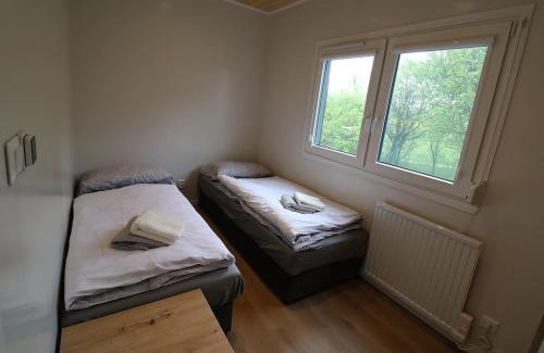Stropesin House | Nový mobilheim (srubového typu)