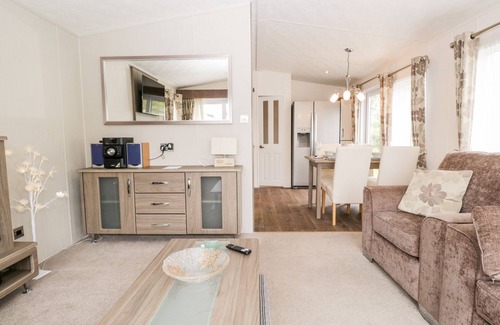 South Lakeland Leisure Village Cottage | NUMBER 10, pet friendly, country holiday cottage, with pool in Warton