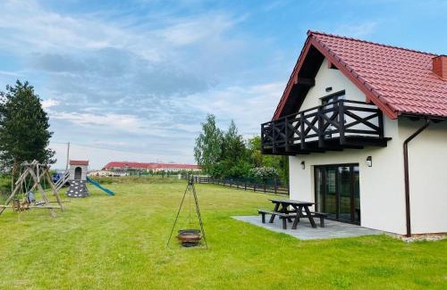 Mikolajki House | O Wilku Mowa!- domki całoroczne
