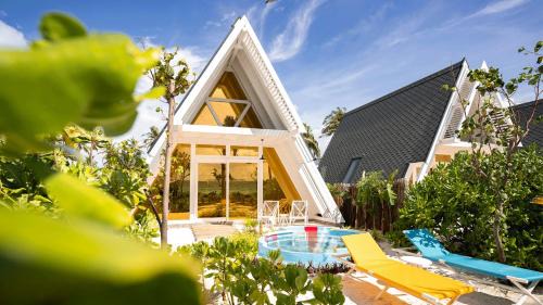 Kanifinolhu Island Resort | Oaga Art Resort Maldives - Greatest All Inclusive Plan with Free Speedboat Round-trip